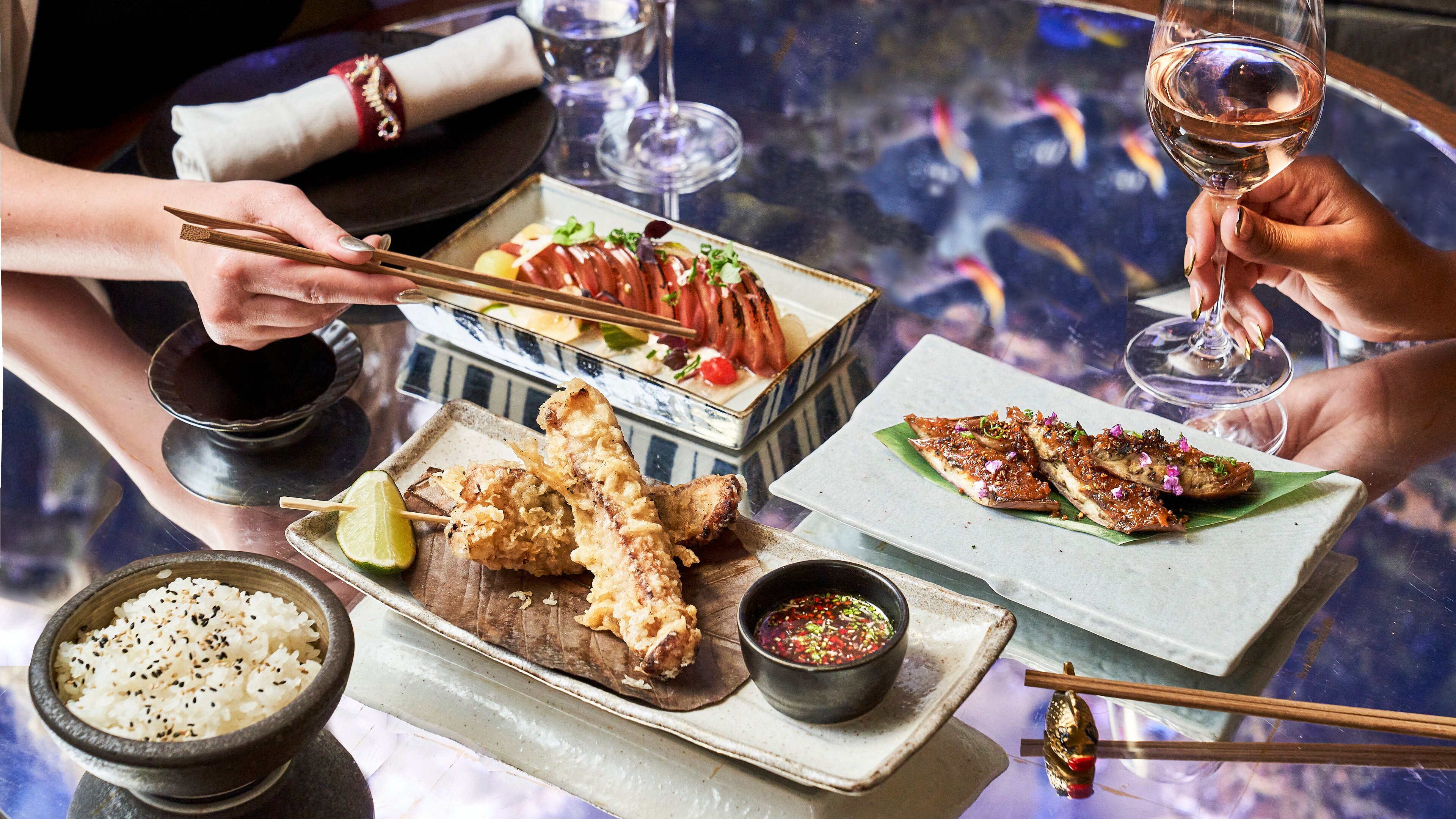 CHARCOAL GRILL FISH BAR restaurant interior showcasing modern and elegant Mediterranean design